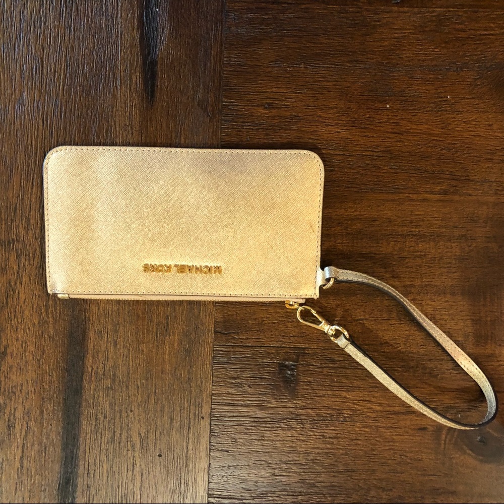 Gold Michael Kors wristlet